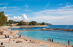 Beach nearby, sun loungers