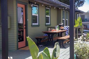 Outdoor dining - 1915 Boho California Beach Kit House (Oceanside)