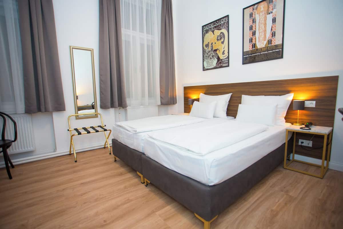 Chambre Confort double | Literie hypoallergénique, minibar, coffre-fort, bureau