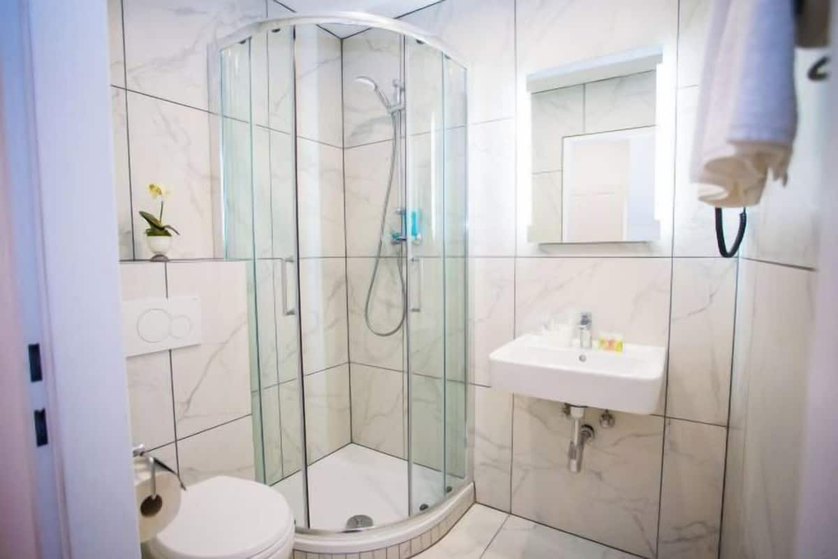 Bathroom | Shower, hair dryer, towels, soap