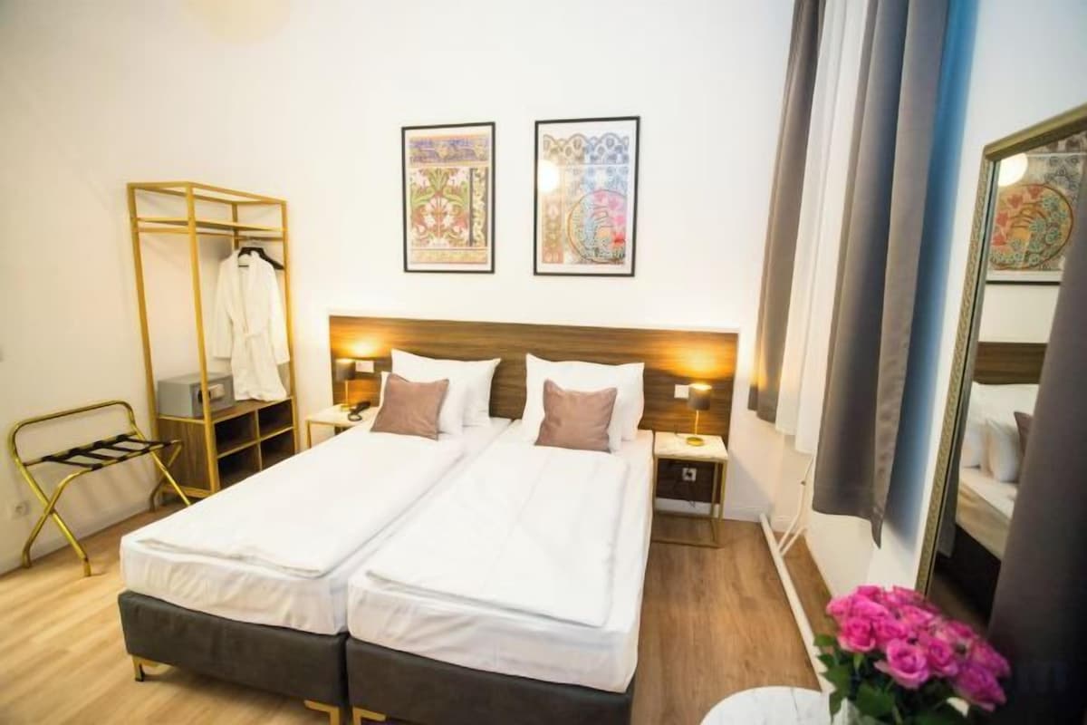 Hypo-allergenic bedding, minibar, in-room safe, desk