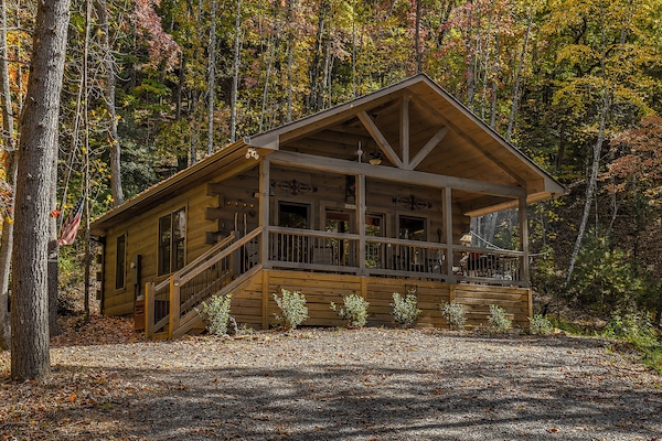 True log cabin with covered porch to enjoy the mountains