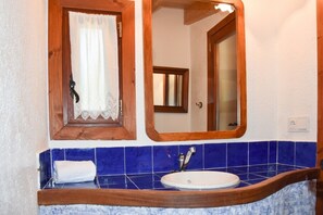 Ducha, artículos de higiene personal gratuitos y secador de pelo