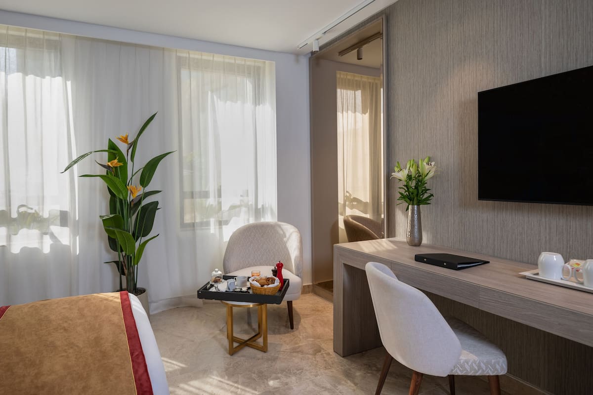 premium bedding, memory-foam beds, minibar, desk