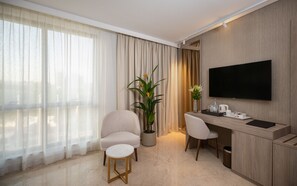 Premium bedding, memory-foam beds, minibar, desk