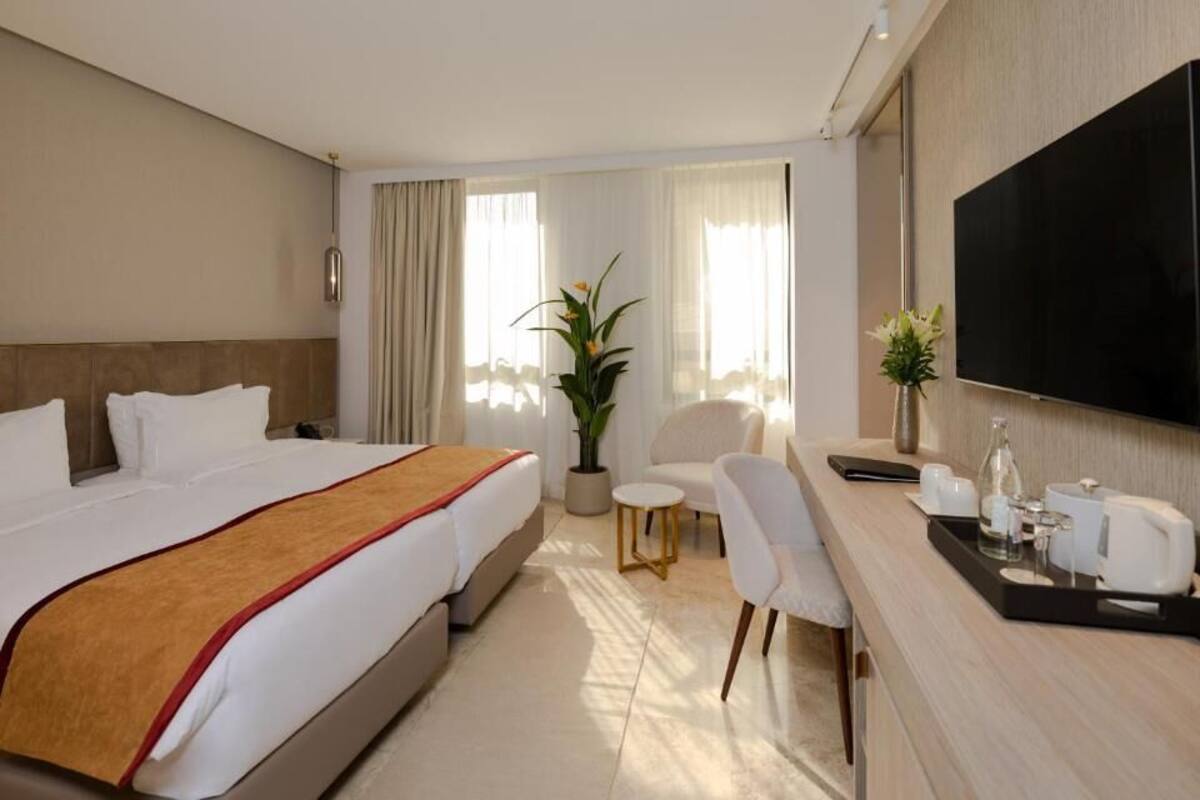 Premium bedding, memory-foam beds, minibar, desk