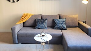 Apartamento Deluxe, baño privado, vistas a la ciudad | Salón