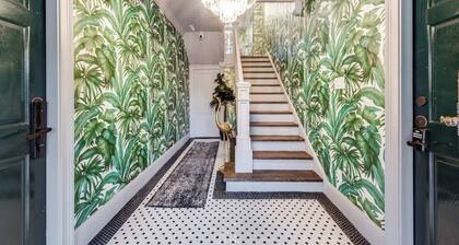 Discover Munger’s historic charm in this luxury 3-bedroom, 3-bath condo for up to 7 guests. Each bedroom offers a private ensuite, luxury linens, and Sleep 8 Technology. Enjoy a chef’s kitchen with high-end appliances and spacious living areas.