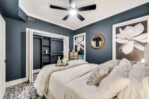 1 bedroom, desk, iron/ironing board, travel crib