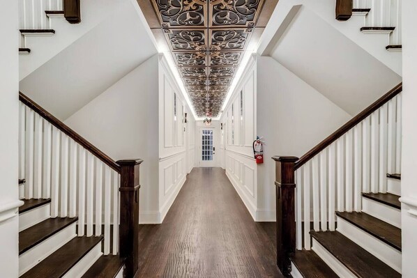 Interior - Step into refined comfort at this historic Dallas residence. Featuring a marble bathroom, 65” smart TV, Luxury hybrid mattress with Egyptian cotton linens.  This serene retreat offers courtyard views (Dallas)