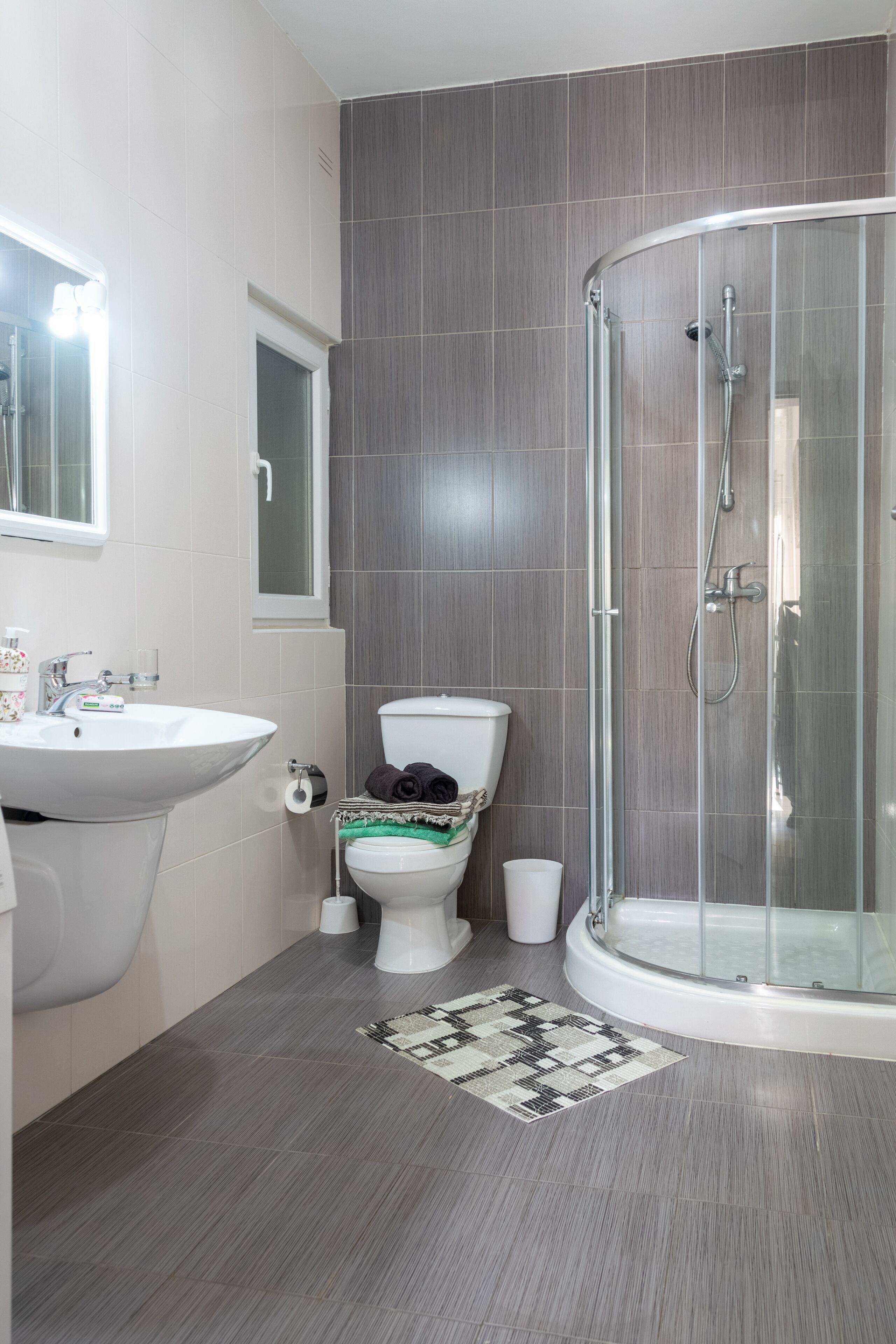 Bathtub, hair dryer, towels, soap