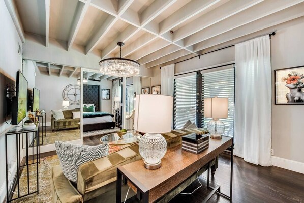 1 bedroom, desk, iron/ironing board, travel crib