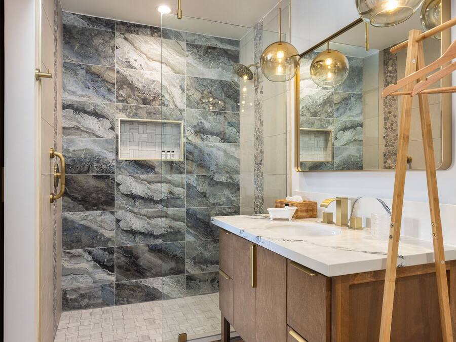 Shower, rainfall showerhead, hair dryer, towels