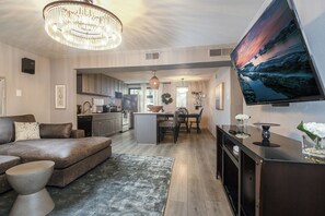 Smart TV, offices - Sophisticated 2-Bed, 1.5-Bath furnished condo in central Dallas with a private patio, serene garden views, and exclusive access to an award-winning courtyard equipped with premium wellness products and relaxing lounge areas. (Dallas)