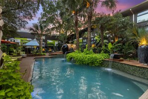 Pool - Experience California-style indoor/outdoor living blended with Dallas luxury in this elegant 2-bedroom retreat. Both bedrooms feature plush king beds, complemented by a full dining room and a 90″ smart TV for cinematic evenings. (Dallas)