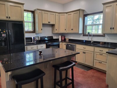 Cozy cabin 16 miles from Razorback Stadium great for game weekends. 