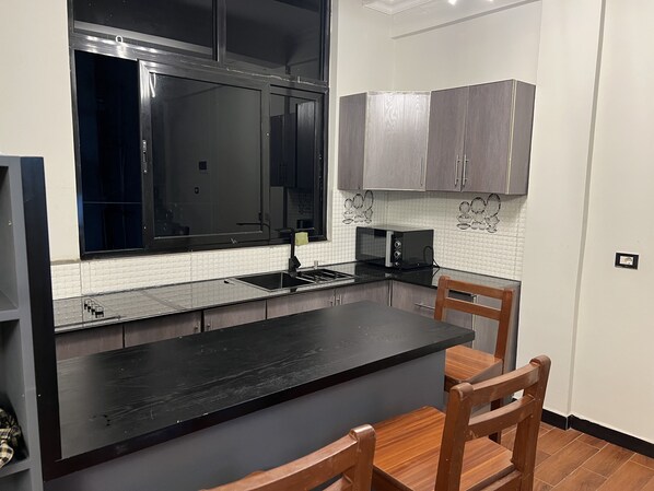 Unclassified image, 1 of 13, button