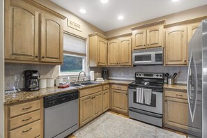 House, Multiple Beds, Fireplace | Private kitchen | Fridge, microwave, oven, stovetop