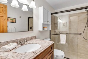 Combined shower/tub, hair dryer, towels, shampoo