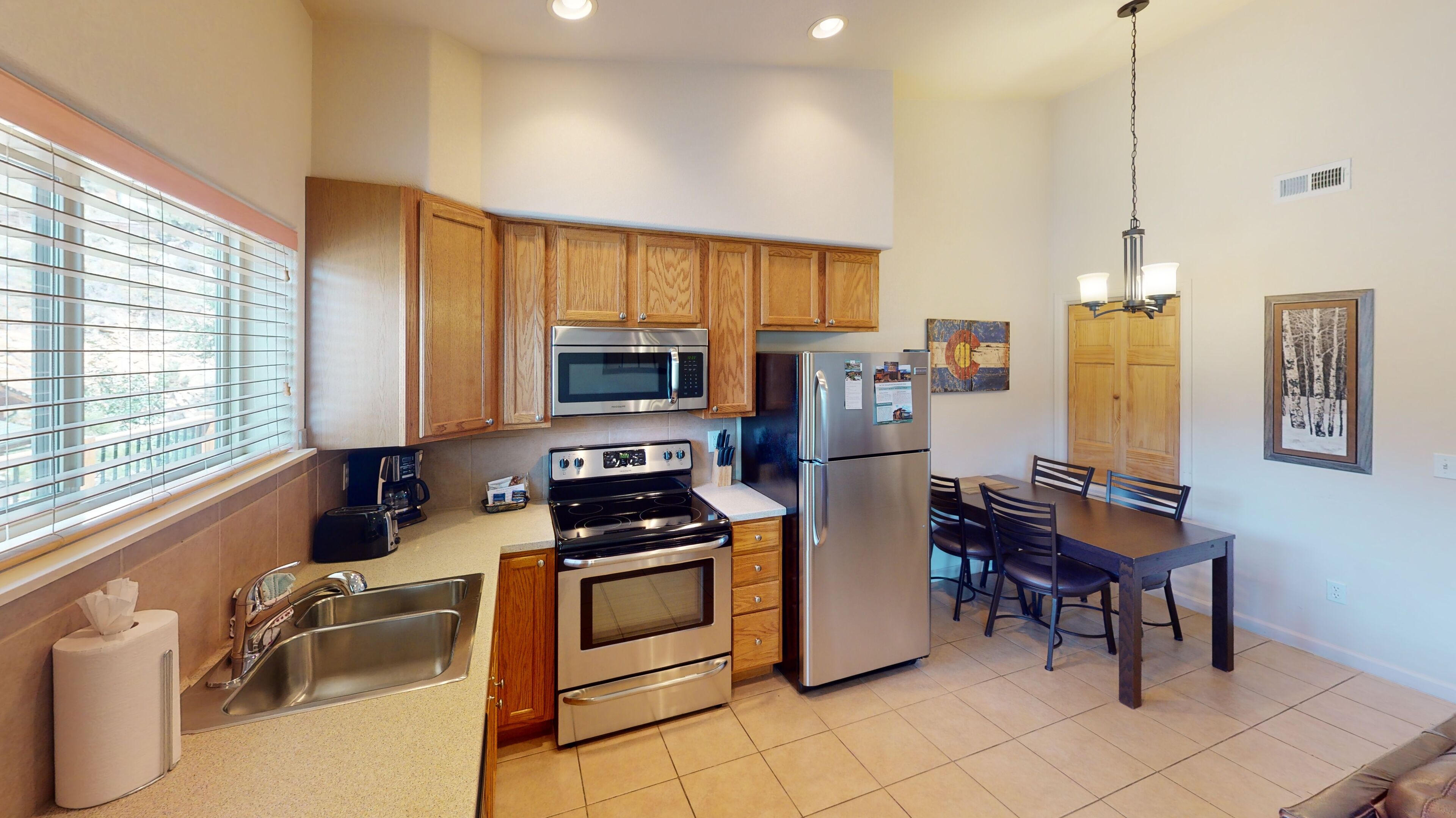 Condo w/ deck overlooking Fall River. 3-minute walk to downtown Estes Park!