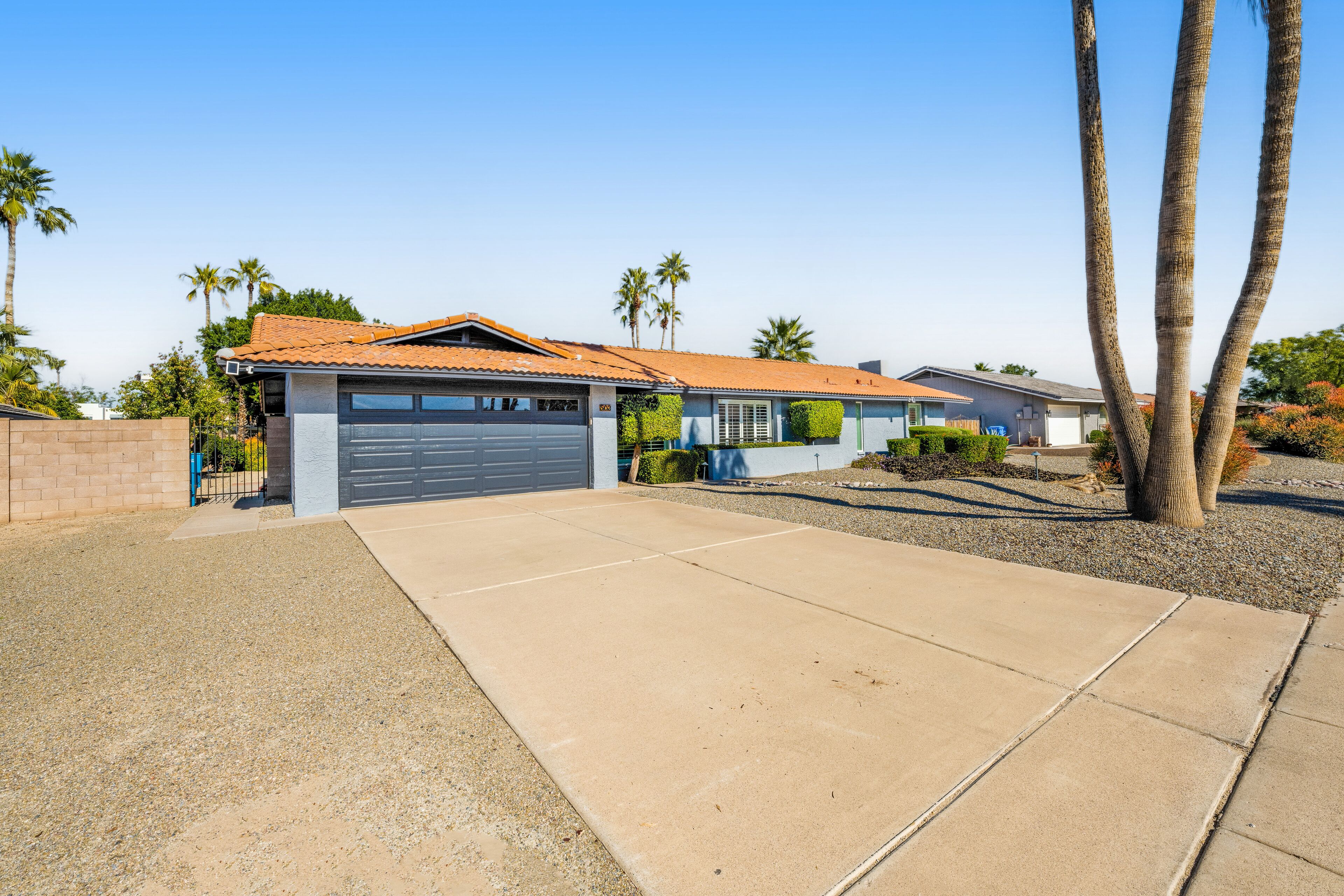 Dog-friendly home with a yard, pool, patio, grill, billiards & putting green