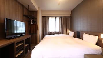 Down comforters, desk, laptop workspace, blackout drapes