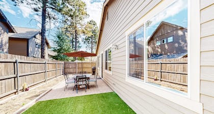 Stylish all-season home with dog-friendly yard, patio, central AC & washer/dryer