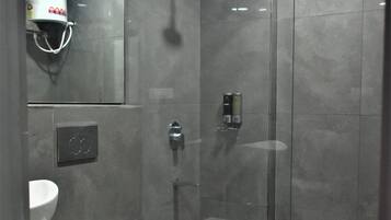 Luxury Room | Bathroom | Shower, towels