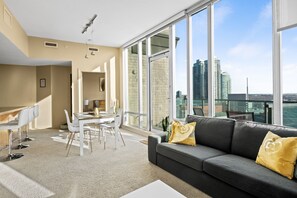 Premium Apartment, 2 Bedrooms, Balcony, City View | Living area | 43-inch flat-screen TV with cable channels, TV, Netflix