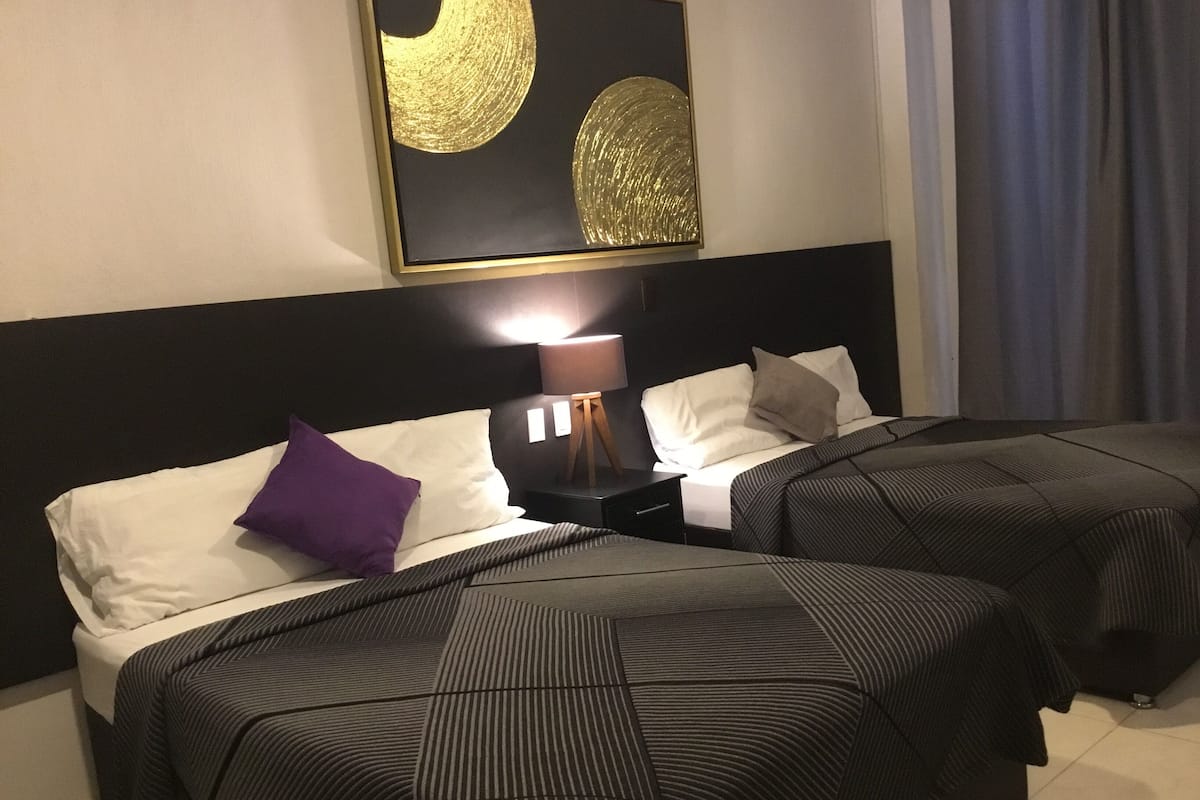 Comfort Quadruple Room (#3) | In-room safe, WiFi (free), bed sheets