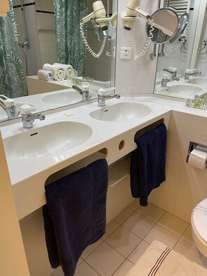 Shower, free toiletries, hair dryer, towels