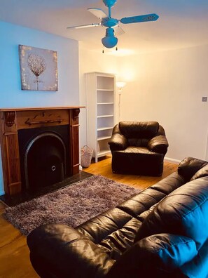 Huis | Woonkamer | Een open haard