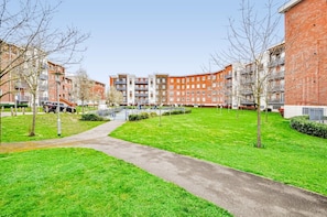 Stunning courtyard with lush greenery and beautifully maintained grounds.