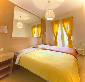 1 chambre, coffres-forts dans les chambres, fer et planche à repasser