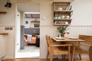 Wagtail Shepherd's Hut - folding dining table with seating for two - Wagtail -  A shepherd’s huts with lots of luxuries, brilliant for stargazing (Greenhead)