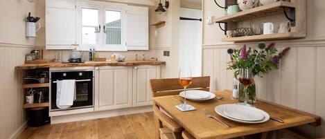 Fridge, oven, dining tables