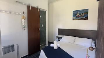 Suíte econômica | Frigobar, individualmente decorados, Wi-Fi de cortesia, roupa de cama