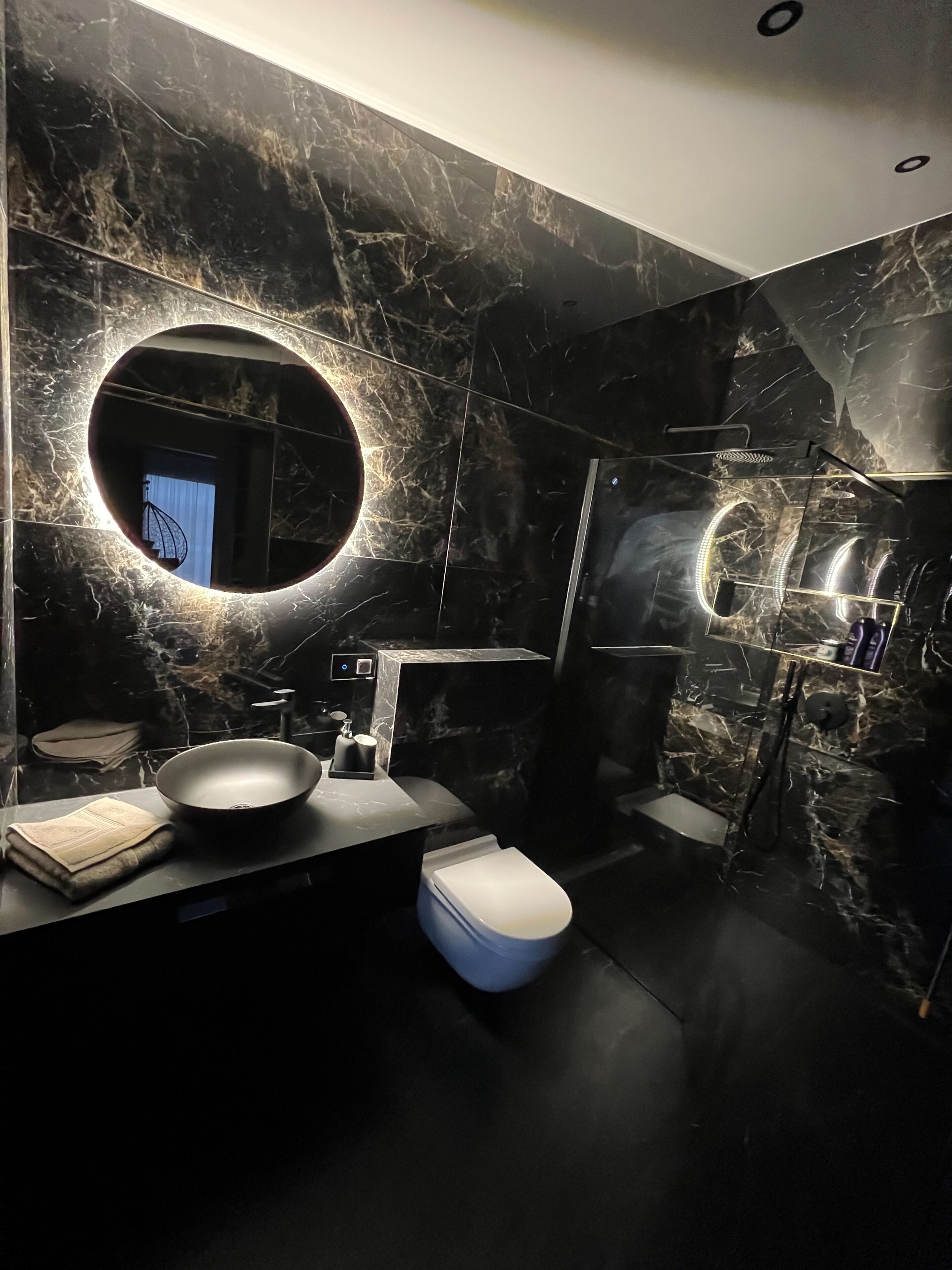 Bathtub, hair dryer, towels, soap