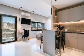 Mini-fridge, microwave, stovetop, espresso maker
