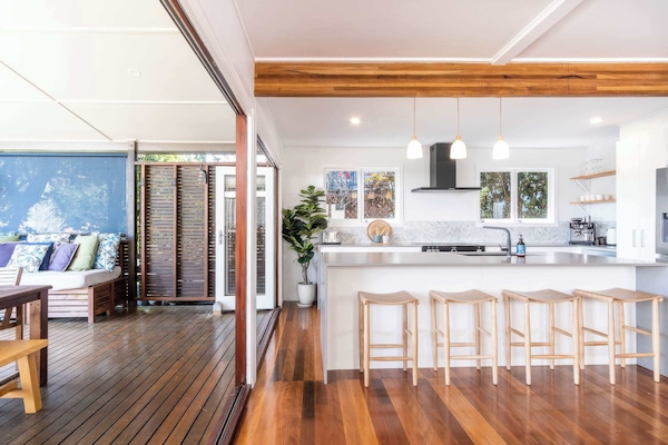 The kitchen opens out onto the deck.