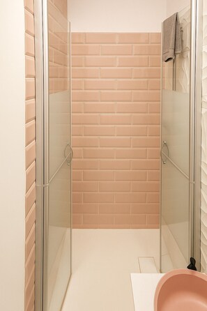 Shower, eco-friendly toiletries, hair dryer, towels