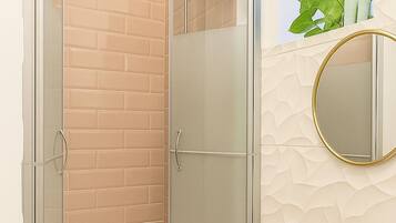 Shower, eco-friendly toiletries, hair dryer, towels