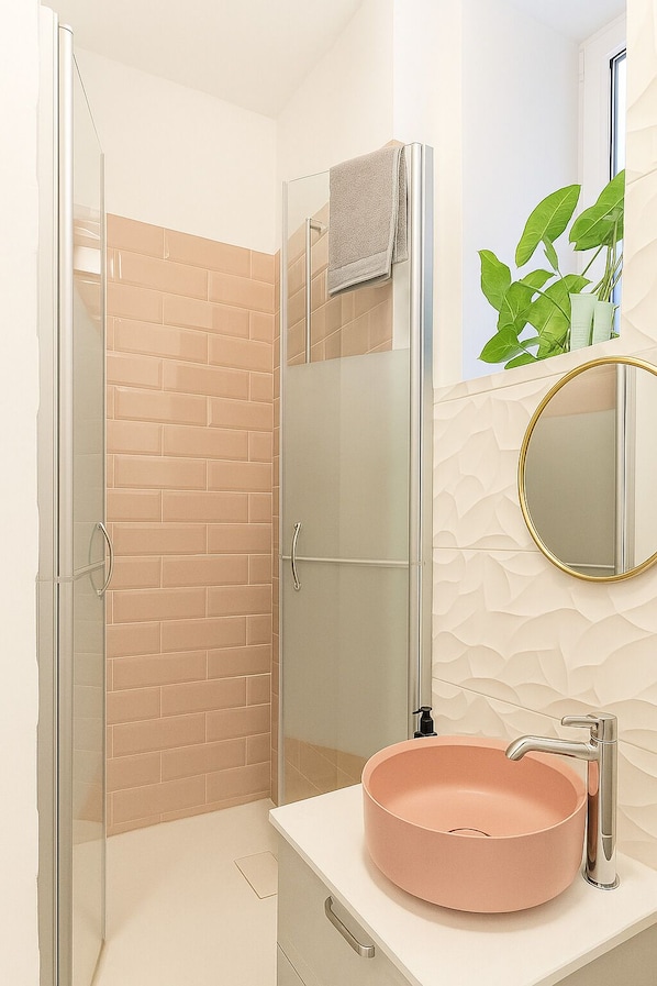 Shower, eco-friendly toiletries, hair dryer, towels