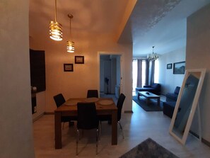Apartamento conforto | Área de estar | TV de tela plana