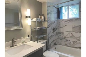 Shower, towels, soap, toilet paper