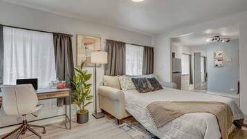 1 bedroom, desk, iron/ironing board, travel crib