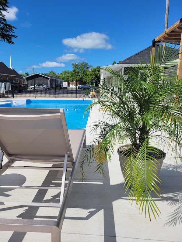 Seasonal outdoor pool, open 8:30 AM to 8:00 PM, free pool cabanas