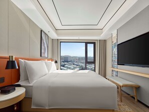 Suíte, 1 quarto | Roupas de cama premium, edredons de pluma, frigobar, cofres nos quartos