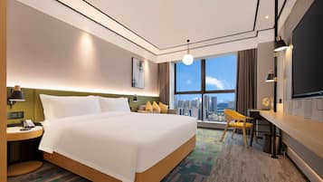 Ropa de cama de alta calidad, cubrecamas y minibar