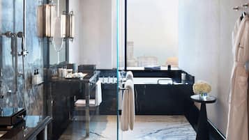 Apartment, 1 Bedroom | Bathroom | Separate tub and shower, rainfall showerhead, free toiletries